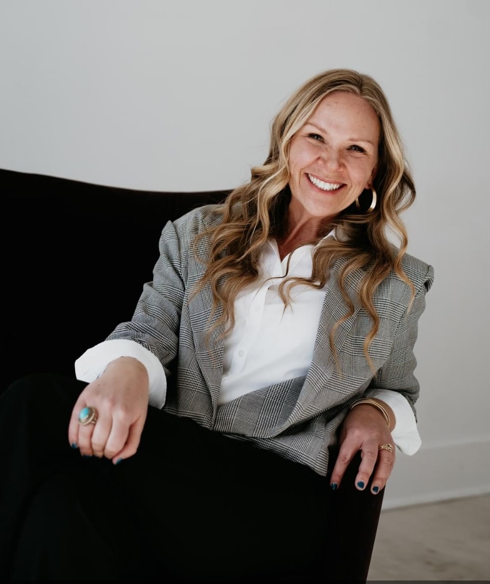 Sara Bigley, North Texas Realtor, smiling in a professional portrait.